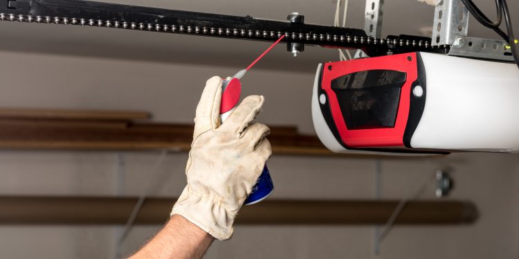 Preventive maintenance on a garage door opener chain with some oil