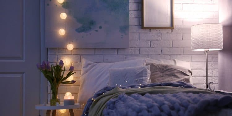 Cozy room interior with comfortable bed. Modern house design