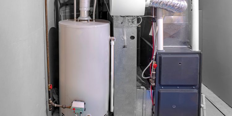 A home high efficiency furnace with a residential gas water heater & humidifier.