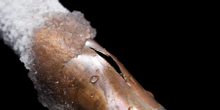 A pipe showing freeze damage