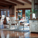 A dining room with a table and chairs Description automatically generated