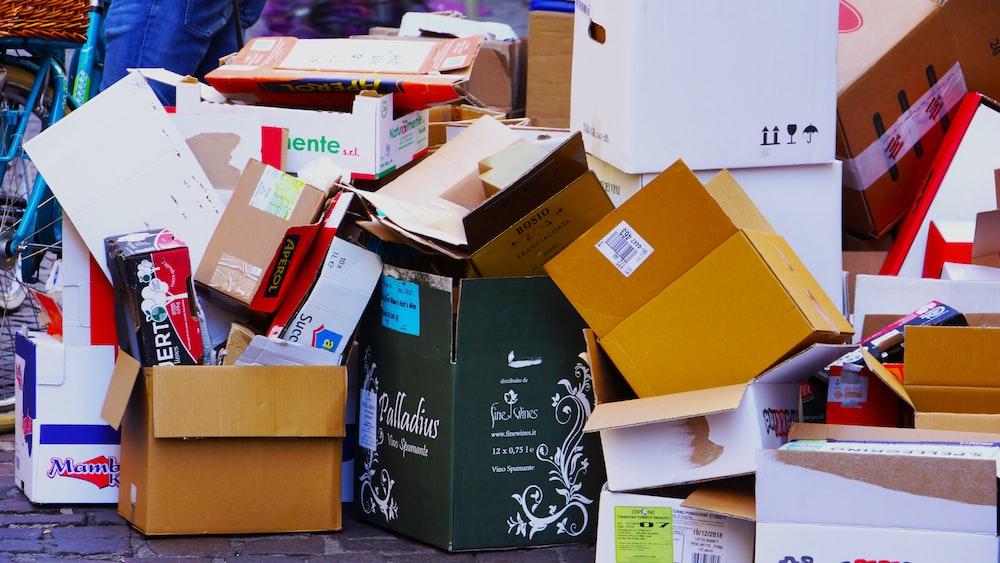 brown cardboard boxes on brown cardboard box