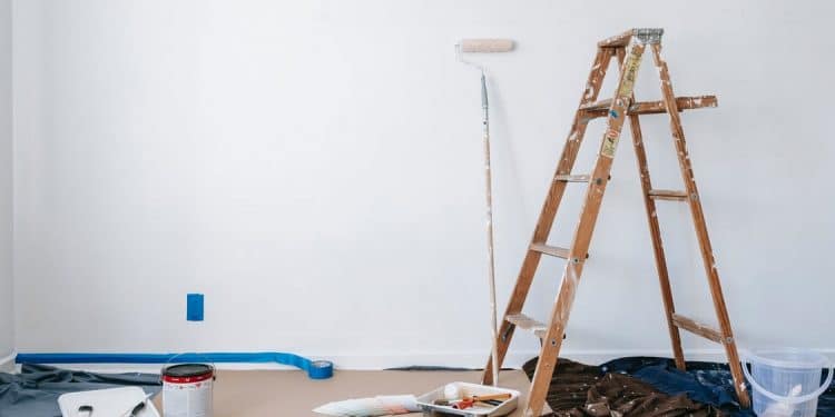 Brown Wooden Ladder Beside Painting Materials