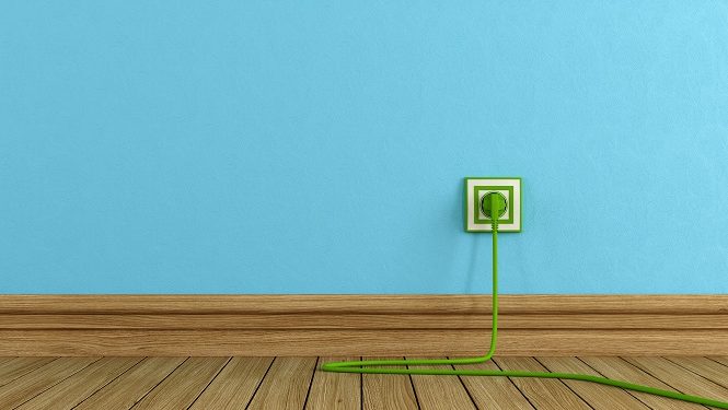 Energy efficiency concept with green electric plugs on blue wall - rendering -