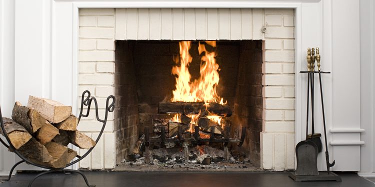 Fireplace with fire burning