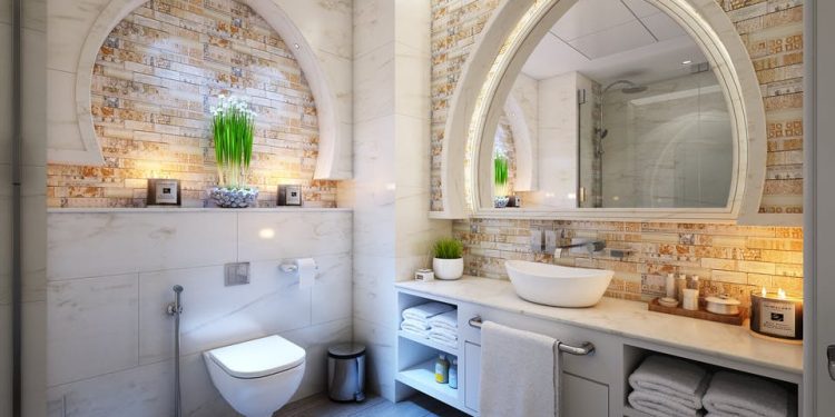 White Towel on Gray Steel Bar